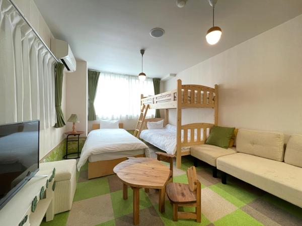 Guest House Laule'a Tennoji : photo 1 de la chambre chambre triple