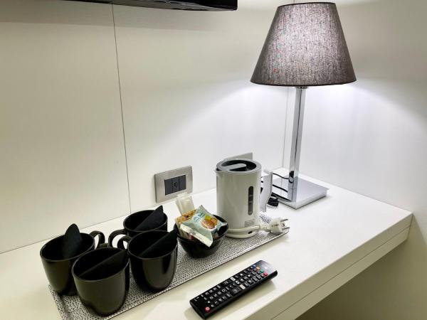 ETNEA STYLE CATANIA LUXURY ROOMS : photo 10 de la chambre chambre exécutive avec 2 lits queen-size