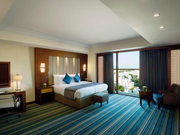 Royal Tulip Muscat : photo 1 de la chambre chambre lit king-size deluxe