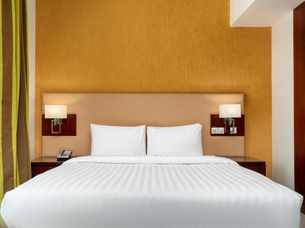 Star Metro Deira Hotel Apartments : photo 1 de la chambre appartement 1 chambre lit king-size