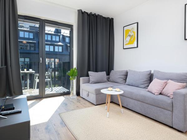 Apartamenty Koło Brzegu by Noclegi Renters : photo 1 de la chambre appartement avec balcon