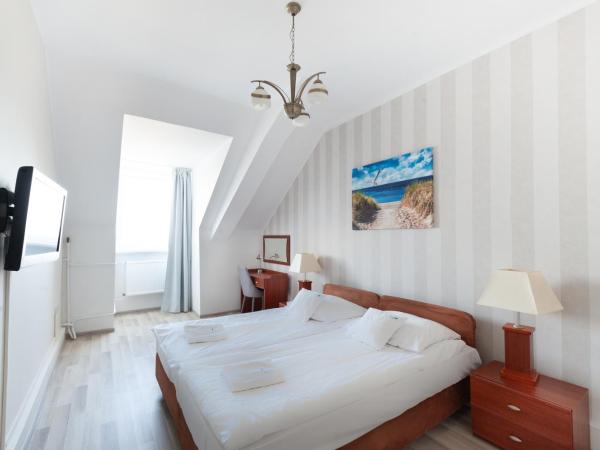 Lido Dom Przy Plaży : photo 1 de la chambre chambre familiale