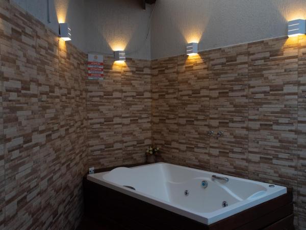 Pousada dos Guardiões : photo 3 de la chambre chambre triple avec baignoire