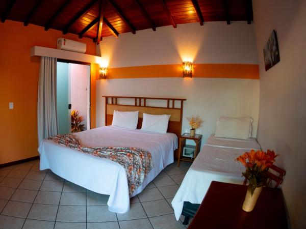 Pousada dos Guardiões : photo 4 de la chambre chambre triple avec baignoire