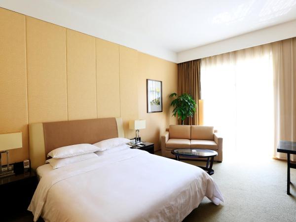 Jinling Resort Nanjing : photo 3 de la chambre chambre lit queen-size avec balcon