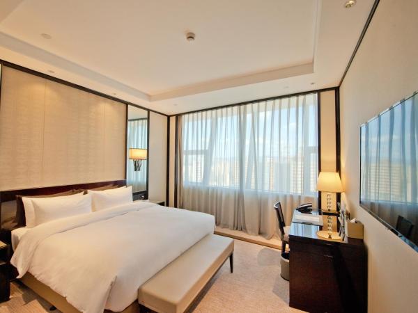 Howard Johnson Plaza Ningbo : photo 3 de la chambre elegant classic king room - non-smoking
