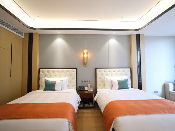 Jinling Funhome Hotel Nanjing Jiulong Lake - Nanjing South Railway Station : photo 5 de la chambre chambre lits jumeaux deluxe - vue sur lac