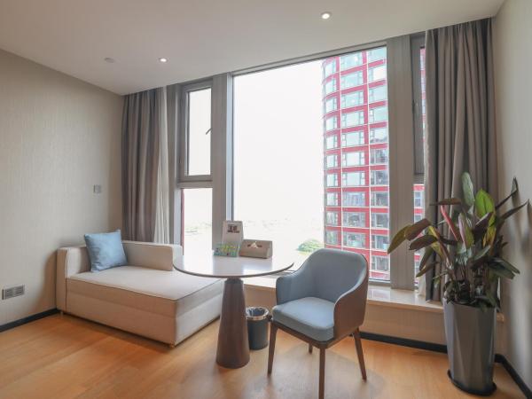 Jinling Funhome Hotel Nanjing Jiulong Lake - Nanjing South Railway Station : photo 4 de la chambre chambre lits jumeaux deluxe - vue sur lac