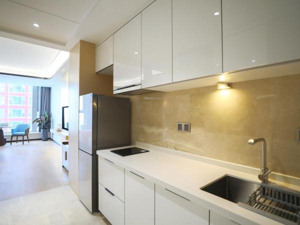 Jinling Funhome Hotel Nanjing Jiulong Lake - Nanjing South Railway Station : photo 3 de la chambre chambre lits jumeaux deluxe - vue sur lac