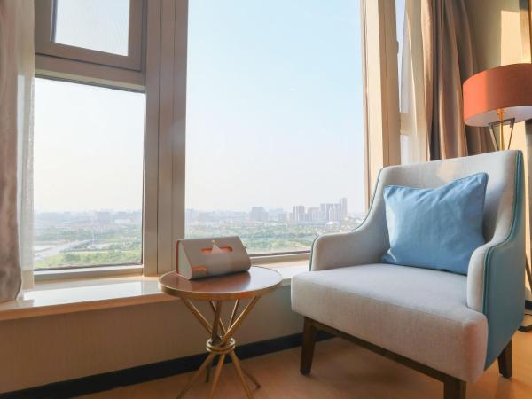 Jinling Funhome Hotel Nanjing Jiulong Lake - Nanjing South Railway Station : photo 2 de la chambre superior  executive suite with garden view
