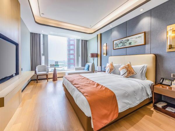 Jinling Funhome Hotel Nanjing Jiulong Lake - Nanjing South Railway Station : photo 3 de la chambre suite familiale de luxe avec vue sur lac 