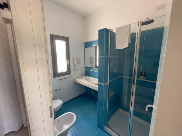 Baia Sangiorgio Hotel & Beach Club : photo 5 de la chambre chambre double ou lits jumeaux - vue sur jardin