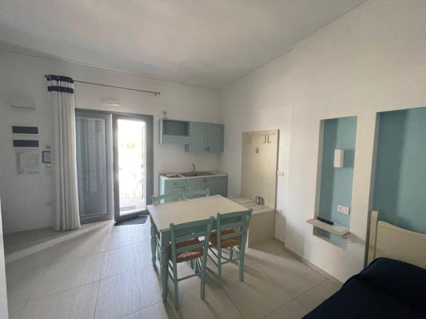 Baia Sangiorgio Hotel & Beach Club : photo 10 de la chambre chambre quadruple - vue sur jardin