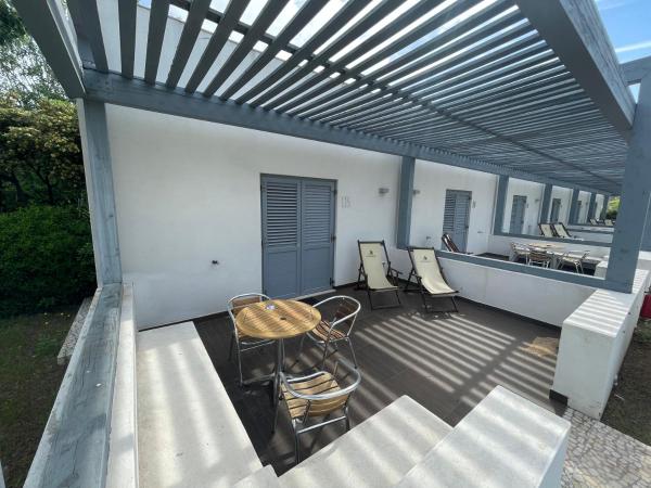 Baia Sangiorgio Hotel & Beach Club : photo 3 de la chambre chambre quadruple - vue sur jardin