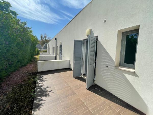 Baia Sangiorgio Hotel & Beach Club : photo 7 de la chambre chambre quadruple - vue sur jardin