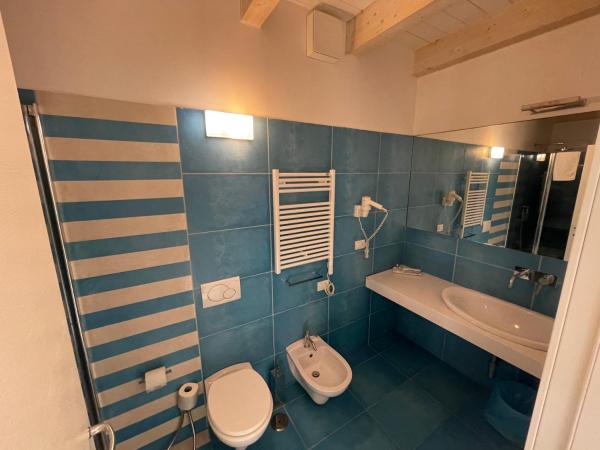 Baia Sangiorgio Hotel & Beach Club : photo 3 de la chambre chambre double ou lits jumeaux - vue sur jardin