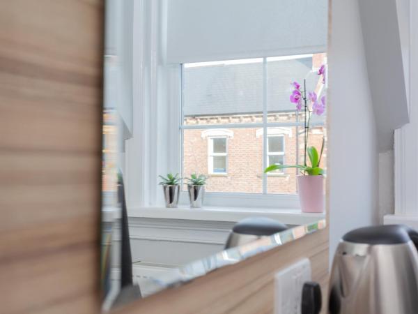 Botanic Rest Queens Quarter : photo 2 de la chambre chambre simple