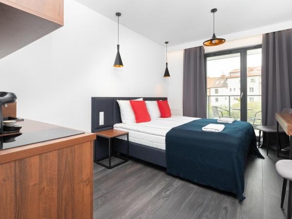 Browar Gdański by Noclegi Renters : photo 1 de la chambre studio supérieur avec balcon