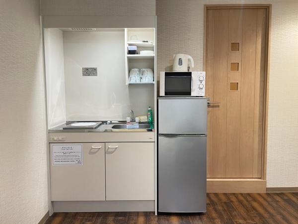 Guest House Laule'a Tennoji : photo 3 de la chambre chambre lits jumeaux standard