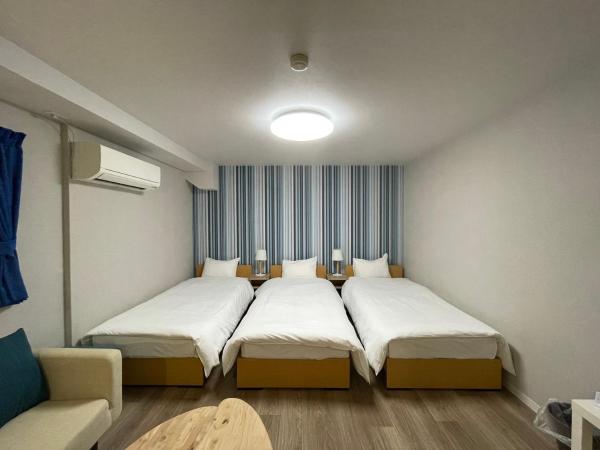 Guest House Laule'a Tennoji : photo 3 de la chambre chambre triple standard