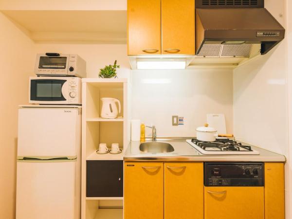 GuestHouse MIYABI : photo 5 de la chambre chambre lits jumeaux standard avec canapé