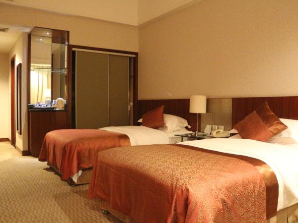 Jinling Jingyuan Plaza : photo 2 de la chambre chambre lits jumeaux supérieure a