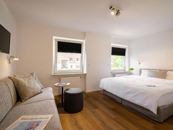 Hotel Wetterstein : photo 4 de la chambre chambre supérieure - vue sur cour