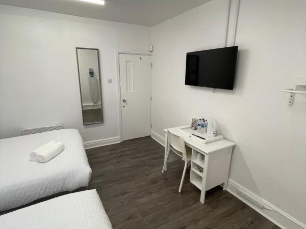 County serviced accommodation : photo 8 de la chambre chambre triple standard