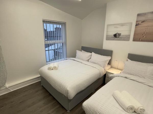 County serviced accommodation : photo 9 de la chambre chambre triple standard