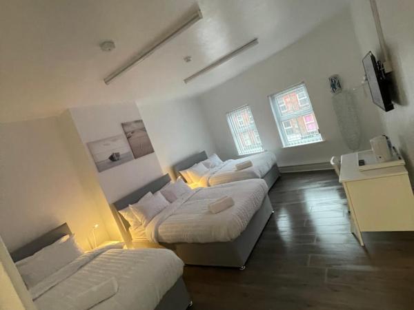 County serviced accommodation : photo 3 de la chambre chambre familiale
