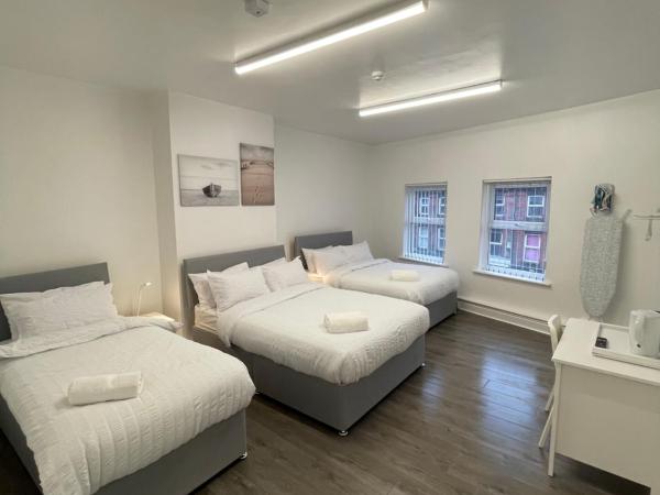 County serviced accommodation : photo 2 de la chambre chambre familiale