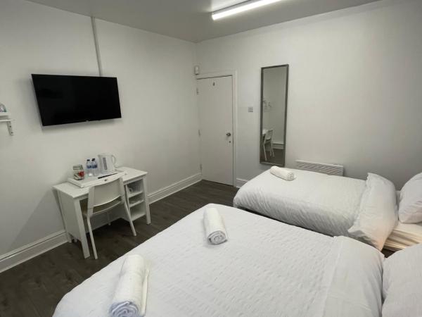 County serviced accommodation : photo 10 de la chambre chambre triple standard