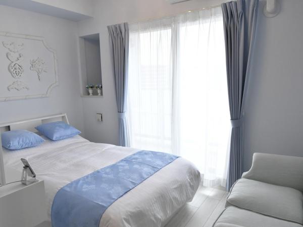 CRYSTAL & RESORT FUKUOKA : photo 1 de la chambre chambre double Économique avec petit lit double