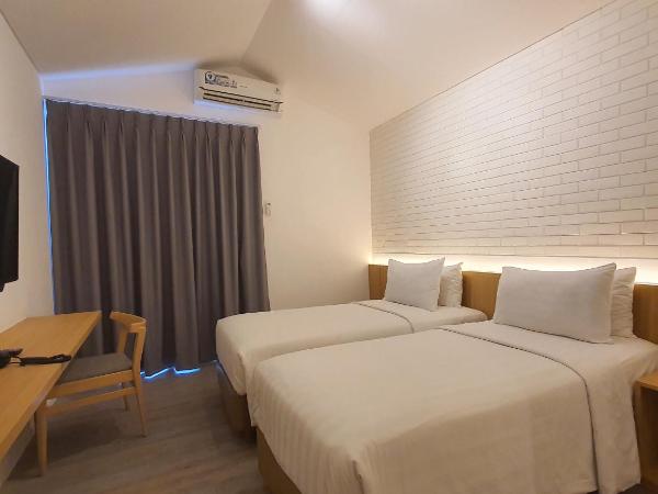 Ra Inn Kemang : photo 4 de la chambre chambre double ou lits jumeaux standard avec balcon