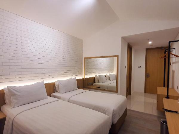 Ra Inn Kemang : photo 1 de la chambre chambre double ou lits jumeaux standard avec balcon