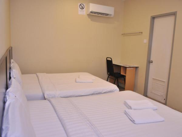 Kuching Transit Inn : photo 5 de la chambre family deluxe (without window)