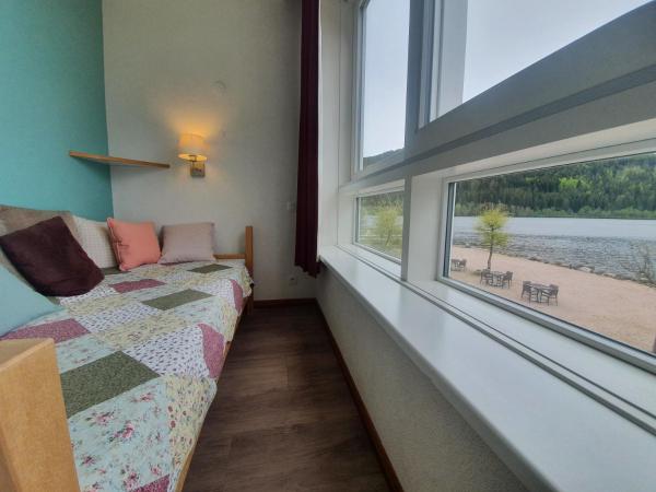 Appart'Hôtel LIDO au bord de l'eau : photo 2 de la chambre studio avec vue sur lac
