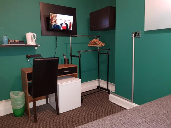 Robin 7 Lodge City Centre : photo 2 de la chambre standard double room with a detached private bathroom