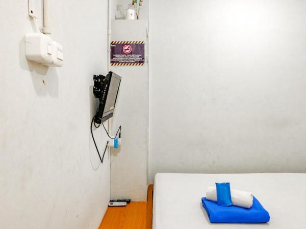 Marson Interkota Residence Mitra RedDoorz : photo 6 de la chambre chambre double standard