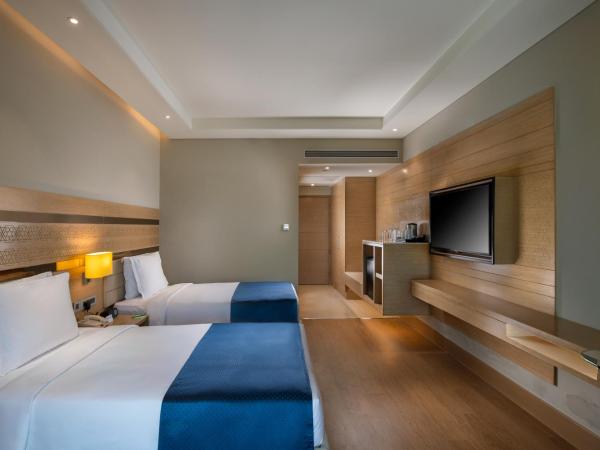 Holiday Inn Agra MG Road an IHG Hotel : photo 1 de la chambre 2 single bed standard low floor room with 15% discount on food and beverages, ironing and laundry | happy hour (1+1) from 4pm to 6pm