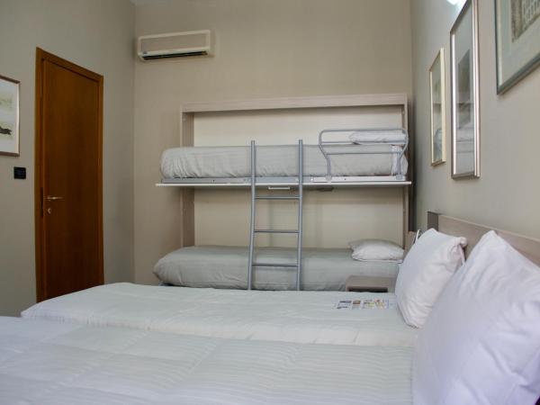 Hotel Gran Torino : photo 1 de la chambre chambre quadruple