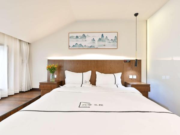Xingshe Alley Courtyard Hotel Beijing Wangfujing Forbidden City Branch : photo 3 de la chambre skylight family room