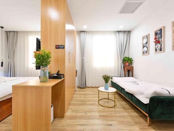 Xingshe Alley Courtyard Hotel Beijing Wangfujing Forbidden City Branch : photo 5 de la chambre li yuan parent-child room