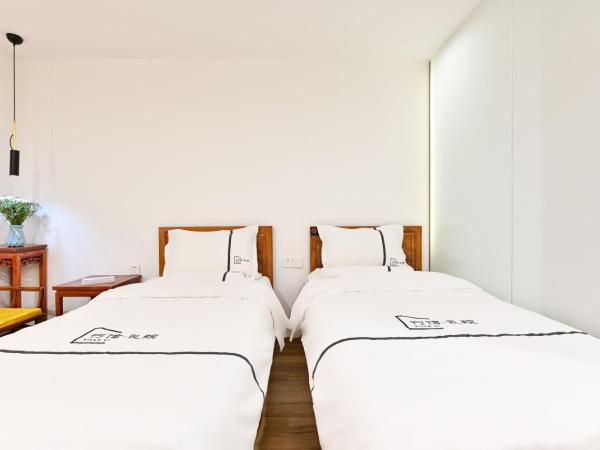 Xingshe Alley Courtyard Hotel Beijing Wangfujing Forbidden City Branch : photo 2 de la chambre chambre triple