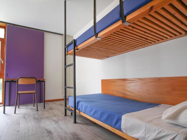 AUBERGE DE JEUNESSE DU MOULIN BLANC : photo 1 de la chambre lit simple dans dortoir pour hommes