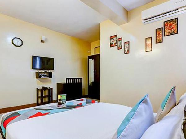 Palm Rooms Near St johns hospital : photo 2 de la chambre chambre simple Économique