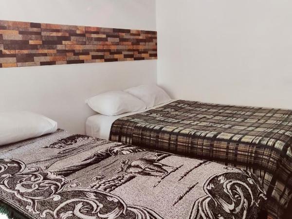 Hostal Maple : photo 5 de la chambre chambre quadruple avec salle de bains privative