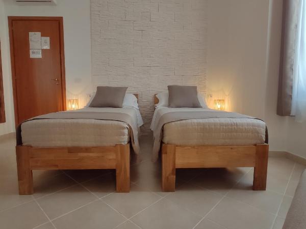 Nell'Azzurro : photo 3 de la chambre grande chambre double ou lits jumeaux