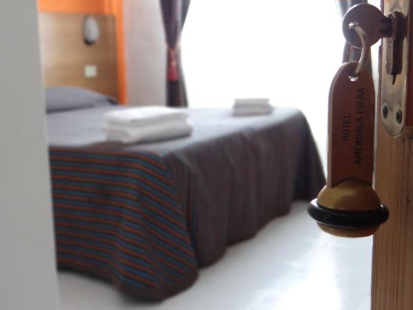 Hotel Amendola Fiera : photo 6 de la chambre chambre lits jumeaux