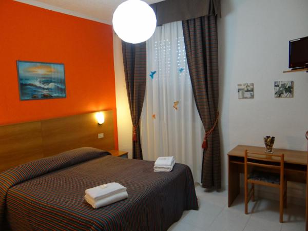 Hotel Amendola Fiera : photo 9 de la chambre chambre lits jumeaux